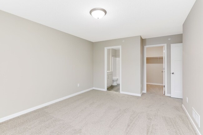 Building Photo - Otsego Townhome for RENT 3bd3ba2gar INTERIOR UNIT available May 01