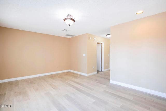 Building Photo - 3831 E Ave T 8