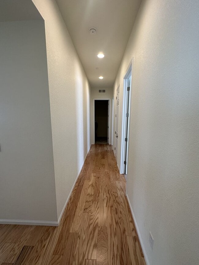 Building Photo - Modern 4-Bed Ranch in Erie with 13-Ft Ceil...