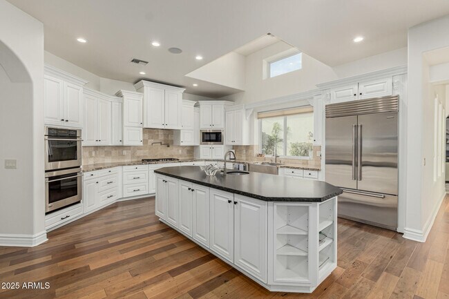 Building Photo - 7002 E Aster Dr