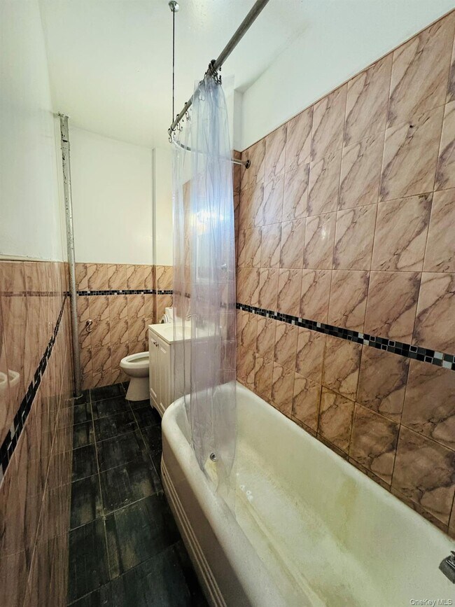 Building Photo - 25-38-38 22nd St