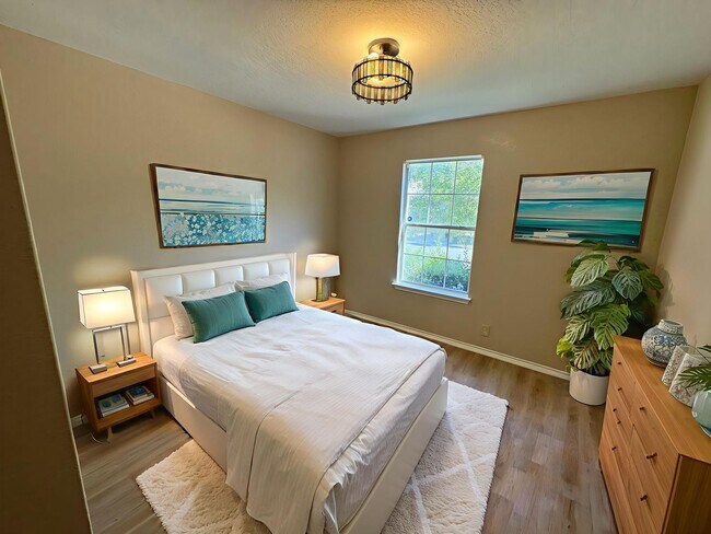 Building Photo - NEW PAINT, FLOORING, APPLIANCES & ROOF  | ...