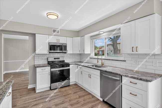 Building Photo - Rare Rental Opportunity in Southfield — Fully Renovated 4-Bedroom Brick Colonial!