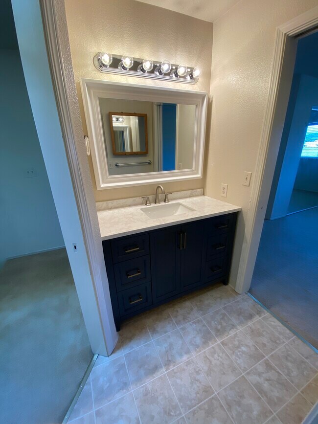 Top floor vanity with pocket doors - 445 Willow Ave