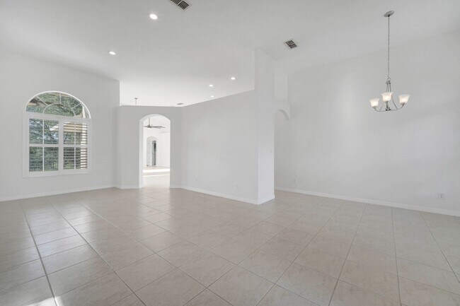 Building Photo - Stunning 4/3 with Fence Enclosed Yard in t...