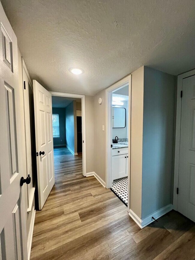 Building Photo - Your Spring Upgrade Starts at The Den