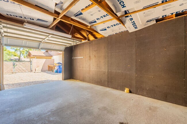 Building Photo - Three bedrooms plus big garage!