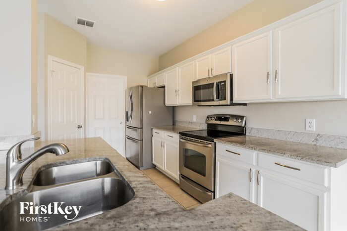 Building Photo - 1617 Bluebird Dr