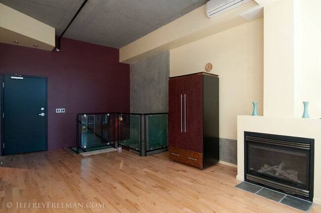 Building Photo - Stunning Penthouse Loft in the Mosaic Condos - Gas Fireplaces, A/C, W/D in unit!