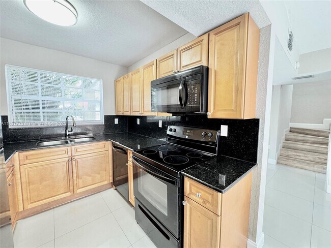 Building Photo - 3840 SW 52nd Ave