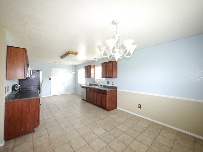 Building Photo - HOME WITH NEW CARPET and LARGE YARD IN WIL...