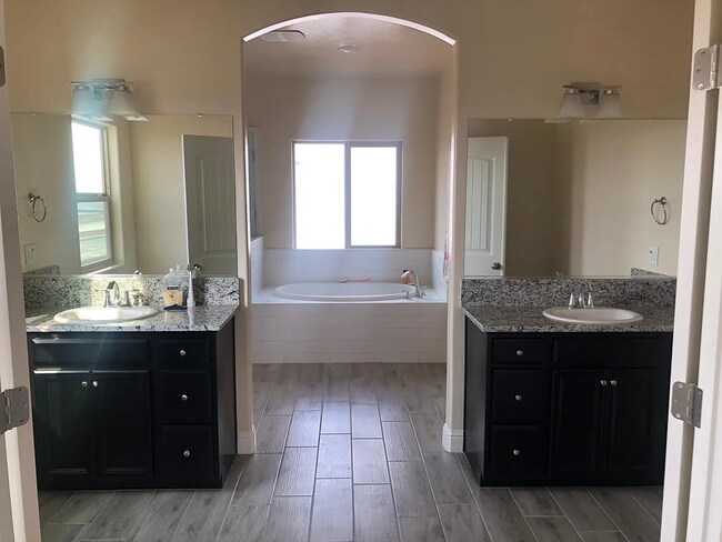 Building Photo - Beautiful Two-Story Home Featuring Granite Kitchen, Large Island & Spa-Style Primary Suite