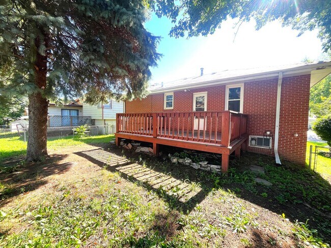 Building Photo - Adorable Brick Raised Ranch