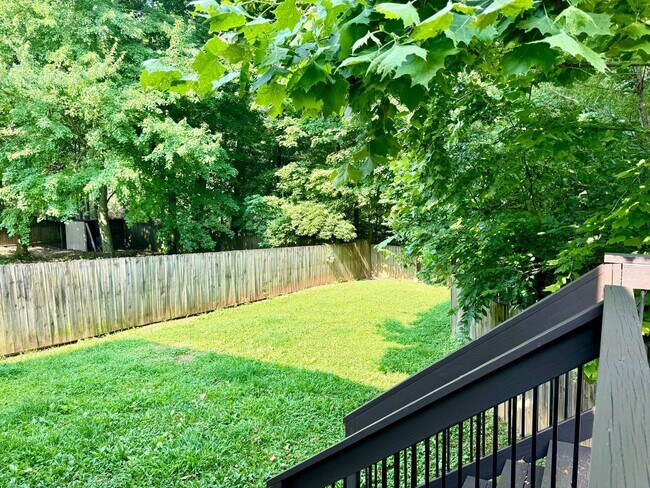 Building Photo - Large Open 4 Bedroom Home with Bonus! Tree Lined Backyard with Privacy Fence!