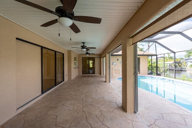 Building Photo - 3 BEDROOM • 2 BATHROOM • PRIVATE POOL • WATERFRONT • BOAT LIFT • ZERO DEPOSIT MOVE-IN AVAILABLE