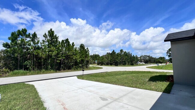 Building Photo - Spacious 3-Bedroom Home with Garage & Pati...