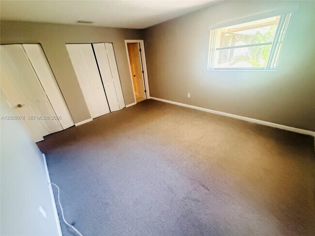 Building Photo - 10787 Royal Palm Blvd