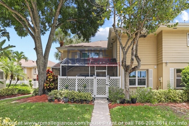 Building Photo - Stylish 2-Bedroom Townhome in Gated Boynto...