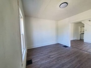 Building Photo - 7401/7311 Brinsmade Ave