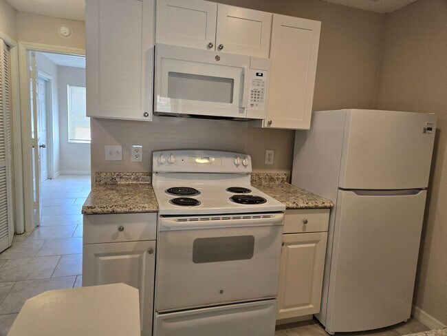 Building Photo - 1300-1306 Melody Ln