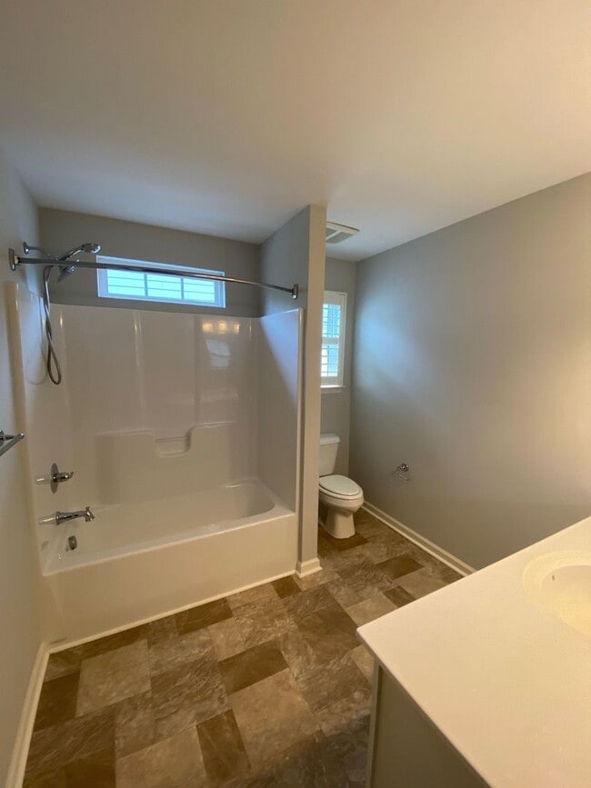 Building Photo - Introducing a stunning Condo with a coasta...