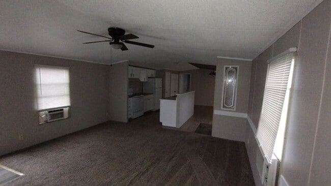 Building Photo - 3 Bedroom with 2 Baths on Large Fenced Lot