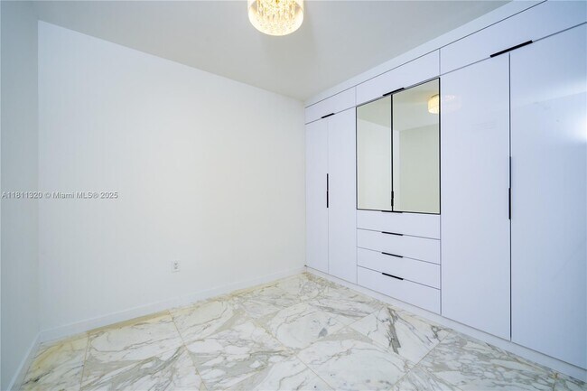 Building Photo - 6365 Collins Ave