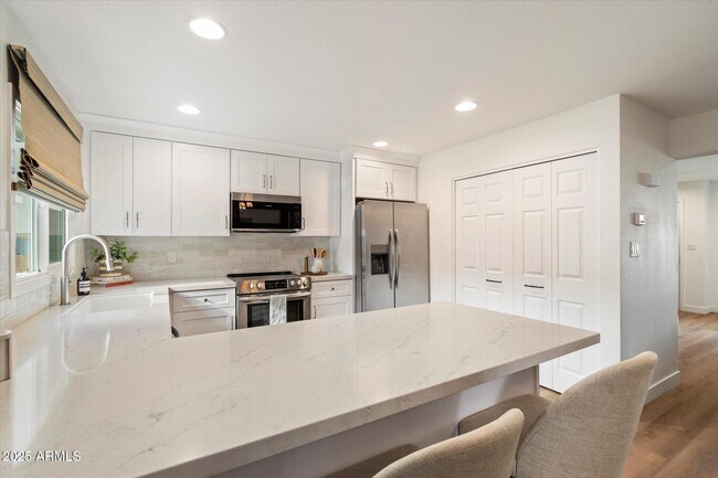 Building Photo - 8447 E Montebello Ave