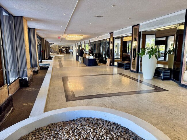 Building Photo - 5555 Collins Ave