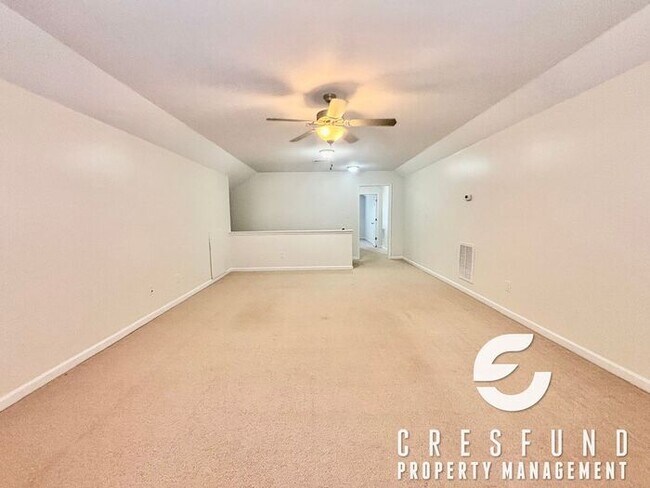 Building Photo - Freshly Painted and Spacious 4 Bedroom, 3 ...