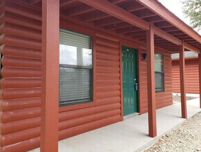 Building Photo - Log Cabin Plaza