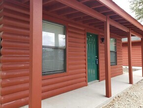 Building Photo - Log Cabin Plaza