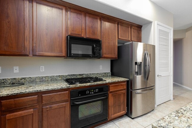 Building Photo - Partially Furnished Condo | Gourmet Kitchen, Pool & Fitness Center | 6-Month Lease Available
