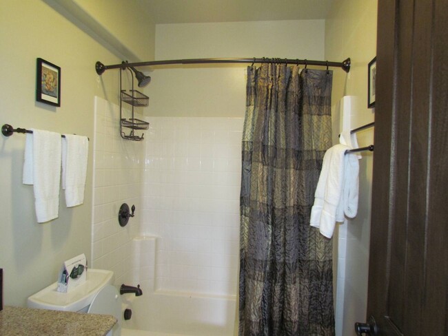 bathroom with shower and tub - 2112 Walnut Ave