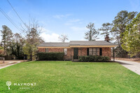 Building Photo - Charming Three Bedroom