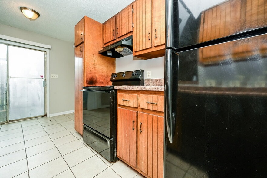 Building Photo - 8536 Pineland Dr