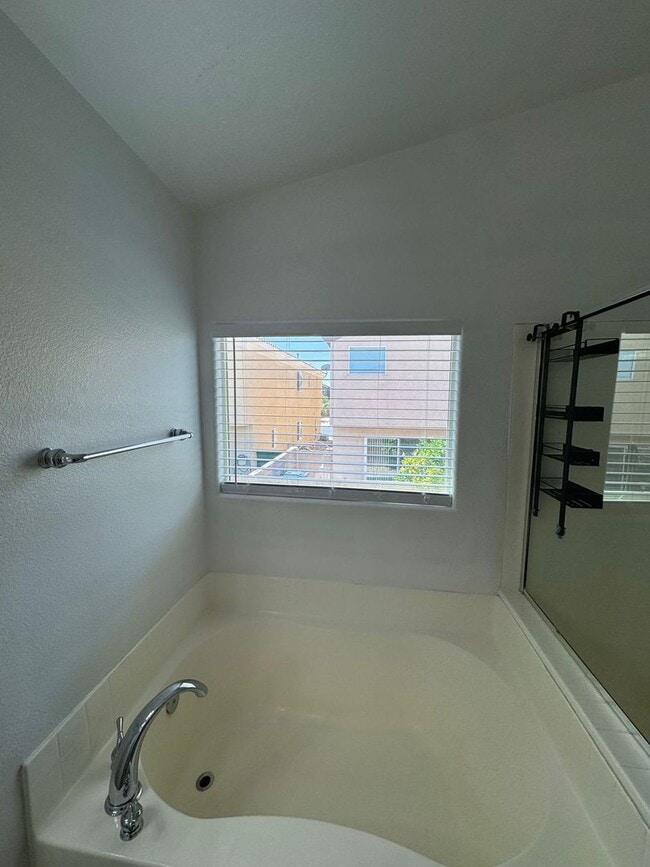 Building Photo - STUNNING 2 STORY HOME IN A GUARD GATED COM...