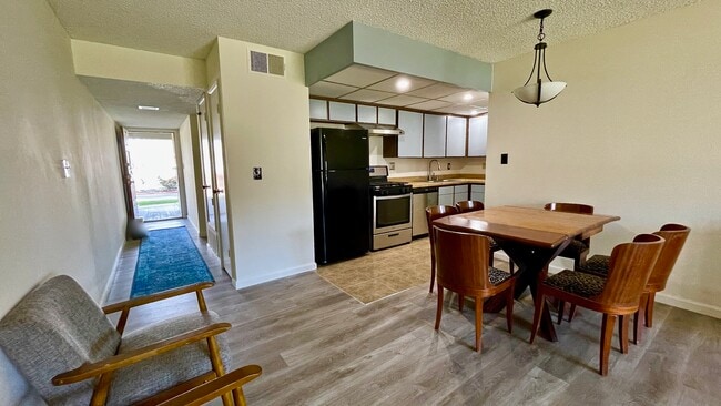 New stove, refrigerator, dishwasher, sink, tile floor, stove vent etc. - 532 Ebbtide Cir