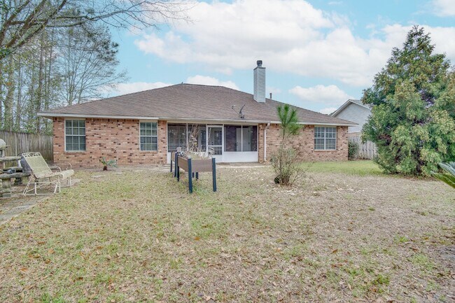 Building Photo - Updated 4BR/3BA Brick Home Near NAS Pensacola with Office & Screened Porch