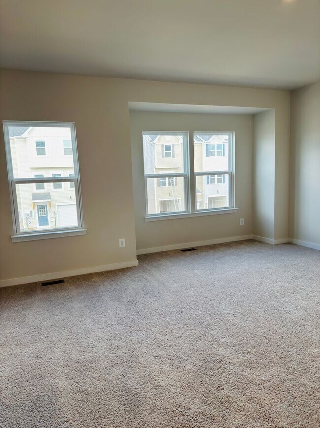 Building Photo - Brand New 4 Bed 3.5 Bath End Unit Townhome in Inwood