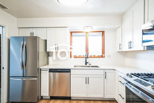 Building Photo - Spacious 4-Bedroom Home with 3 Bathrooms and a 2-Car Garage