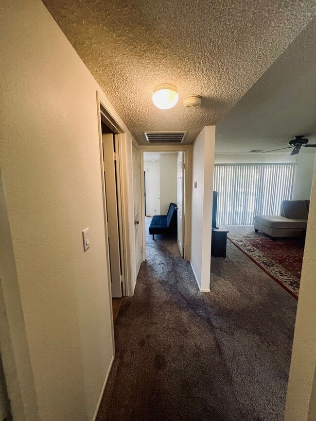 Building Photo - Affordable Comfort in 55+ Guard-Gated Comm...