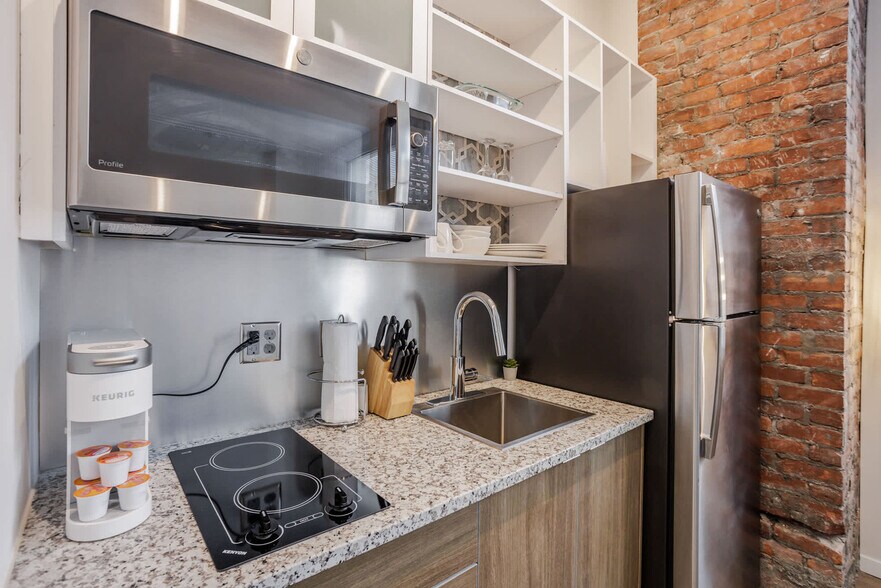 Building Photo - 9-JAN-JAN E 4th St