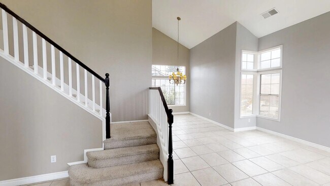 Building Photo - Available now! Two-story stunner for lease...