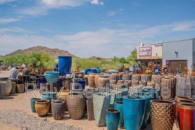 Building Photo - 6050 E Hidden Valley Dr