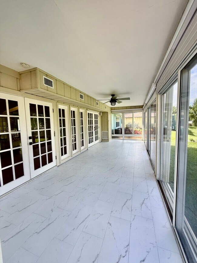 Building Photo - Palm City Home with Dock and Lift