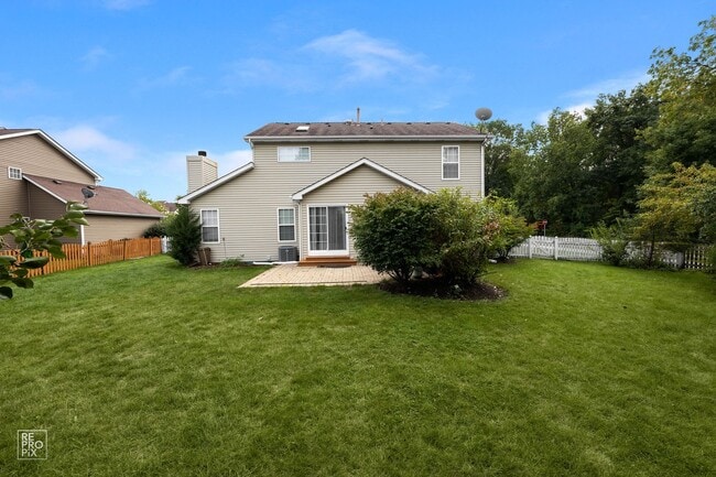 Building Photo - Aurora Four Bedroom Home with Fenced Yard ...