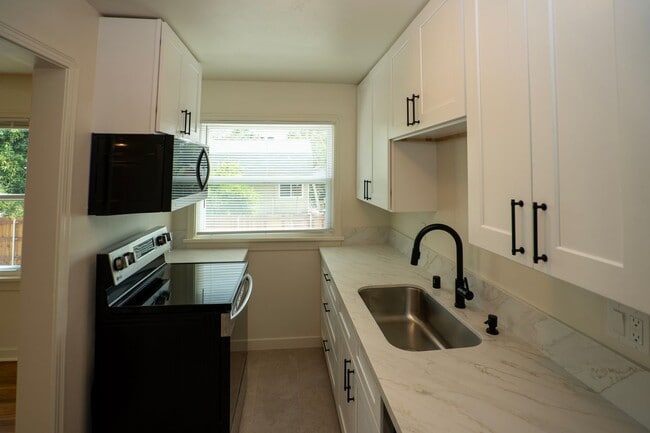 Building Photo - Step into timeless elegance and modern com...