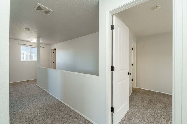 Building Photo - 4 Bedroom 2.5 Bathroom With Large Fenced B...