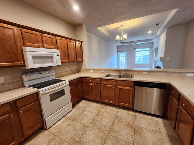 Building Photo - 3/2 townhome available for rent August 6, 2026, renting for $1795 per month, privacy fenced back ...